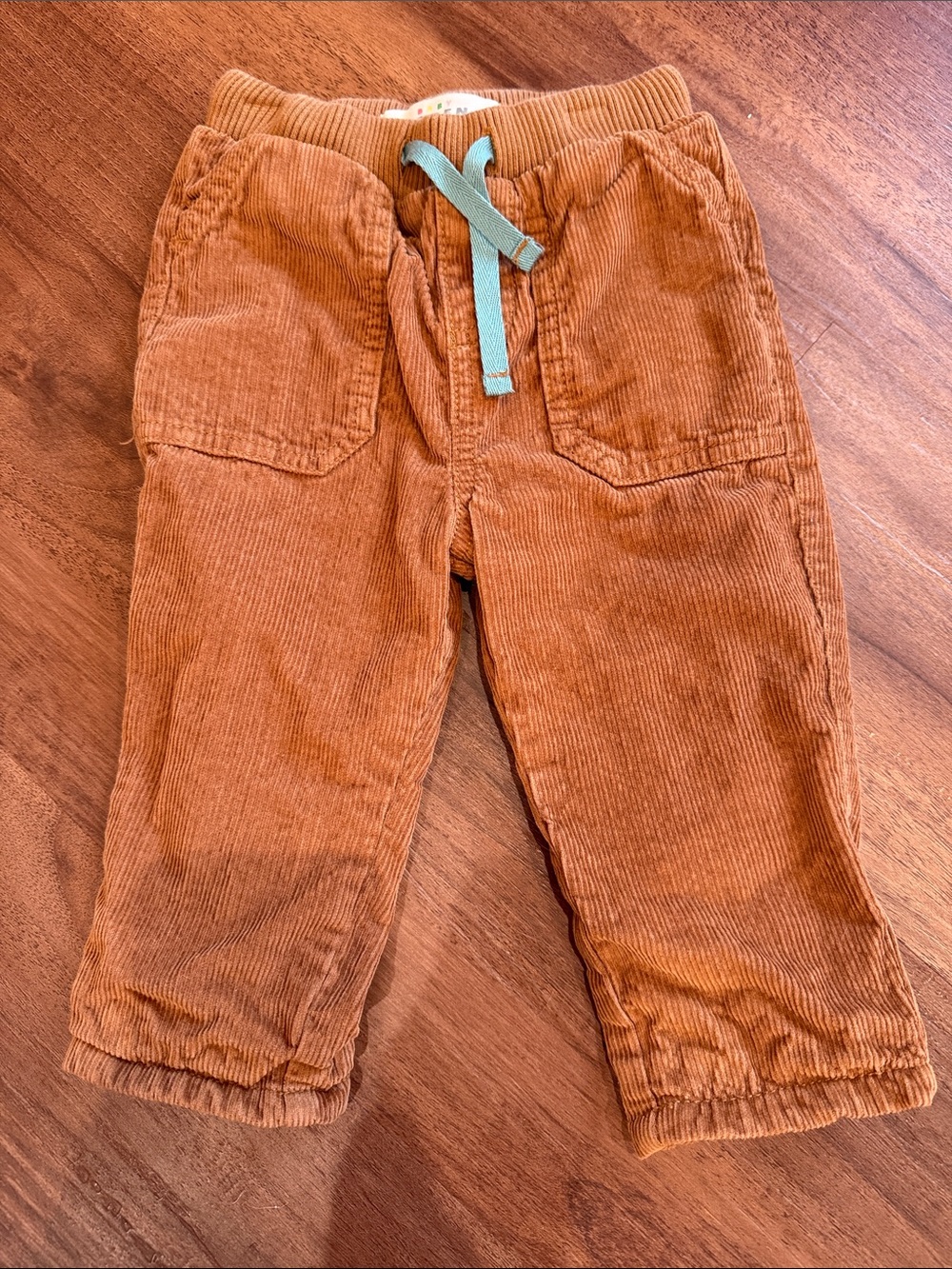 Baby Boden Corduroy Pull-On Pants in Rust with Teal Drawcord